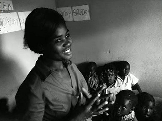 ZambiaLusakateacher.jpg - Zambia: During his tour of this Consciousness-Based Education school in Lusaka Dr Morris was impressed with the atmosphere of happiness and the positive view of the school's future expansion by staff, students, and parents.