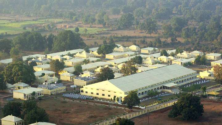11_brahmasthan.jpg - An assembly hall and some residences of the Maharishi Vedic Pandits in the Brahmasthan of India.