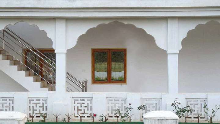 37_building.jpg - Guest buildings in the Brahmasthan of India feature solar hot water, Internet, and air conditioning.