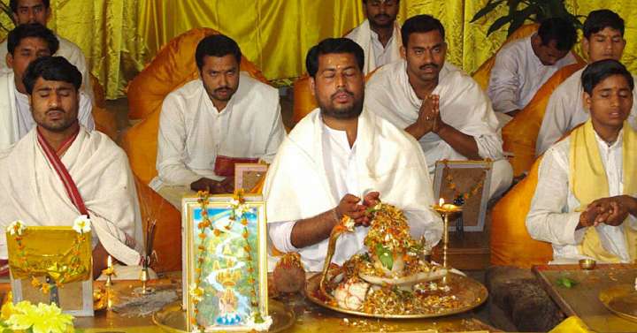 51_pandits.jpg - Verson 1: One sinks deeply into the quiet depths of the mind while listening to Vedic recitation in the presence of the Maharishi Vedic Pandits. Visitors report experiencing a profound, wholistic enlivenment to the mind and physiology. In the richness of the blissful experience they often think to themselves, ?I?m the luckiest person on earth?.Version 2 (bah!): Guests to the Brahmasthan of India can take the opportunity to enjoy the daily Vedic recitation of coherence-creating groups of Maharishi Vedic Pandits.