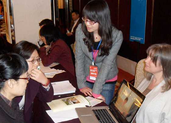 07China.jpg - A mother and daughter who listened to the presentation were appreciative of the complete development and success in life of Maharishi school students.