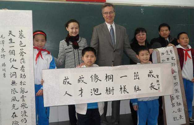 24China.jpg - Dr Beall received gifts of art calligraphy from the primary schools students.