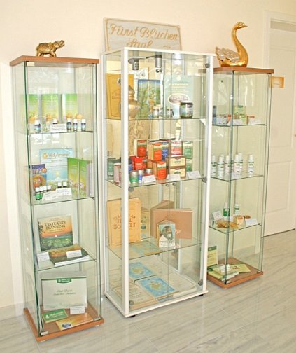 Slide09.jpg - The display case is filled with Maharishi Ayurveda herbal products, as well as the latest publications on the different aspects of Vedic Science, including a new book on Vastu architecture.