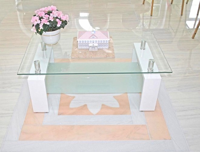 Slide13.jpg - In the large open central meeting hall on the ground floor, an inlaid marble design marks the Brahmasthan, the centre point of the building.