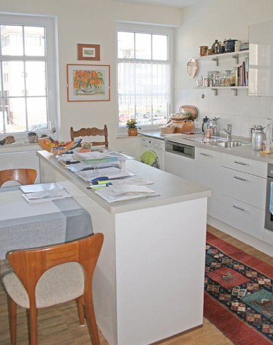 Slide23.jpg - This lovely light-filled room doubles as an office and a kitchenette, with dedicated spaces for each activity and is an example of the creative planning that is found throughout the building.