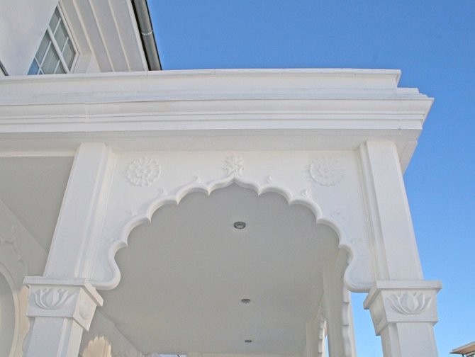 Slide33.jpg - Definition and detail above the front porch also reflect the MERU Master Builder System that will be employed around the world in the construction Maharishi Peace Palaces.