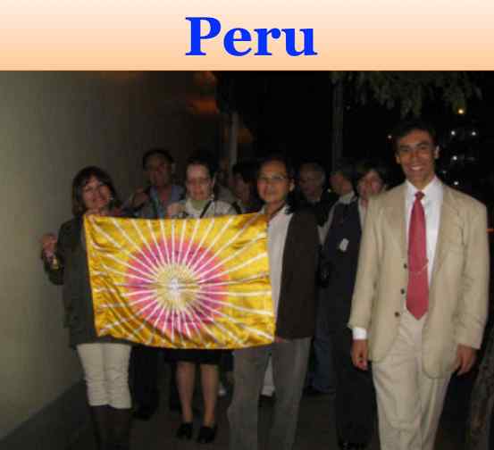 Peru2.jpg - Peru: The evening celebration of Victory Day included a procession outdoors with Dr Javier Ortiz, right, the National Director.