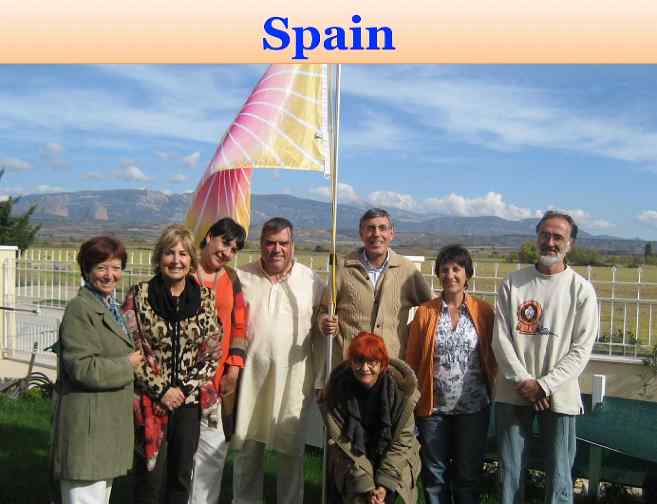 Spain2.jpg - Spain: The flag-raising and Victory Day celebration was held at the Vastu residence of Dr Antonio Bartolome (centre, beige jacket).