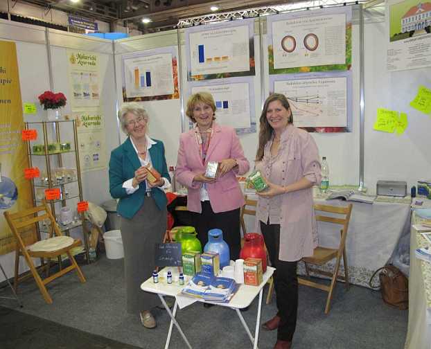Germany_03.jpg - Germany: At the annual national health fair in Erfurt the booth for Maharishi?s Vedic Approach to Health had many visitors learning about Transcendental Meditation, VedAroma oils, Maharishi Light Therapy with Gems, and Maharishi Ayurveda products.