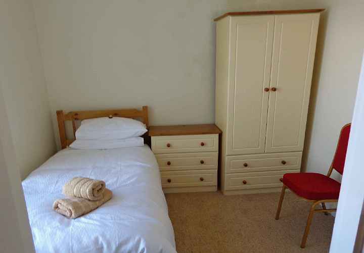 030Ire.jpg - 27 August 2014 The building has 18 ensuite single rooms. Already there is a need for, and plans for, expansion. Three smaller buildings, when completed, wil provide another 18 rooms. As initial start-up costs that included the necessary infrastructure- like energy, solar panels, a pontoon for safe landing, etc.- have been covered, expansion expenses will be more reasonable.