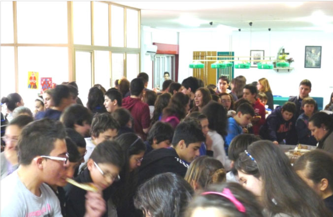 Italy_102.jpg - After the meeting the students enjoyed a variety of Italian dishes at a potluck feast?prepared and sent to the school by their parents.