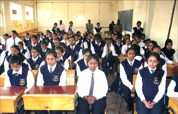Slide29.jpg - March 2012Miss Kwatra's students of Arya Girls Secondary School practising Transcendental Meditation in class.