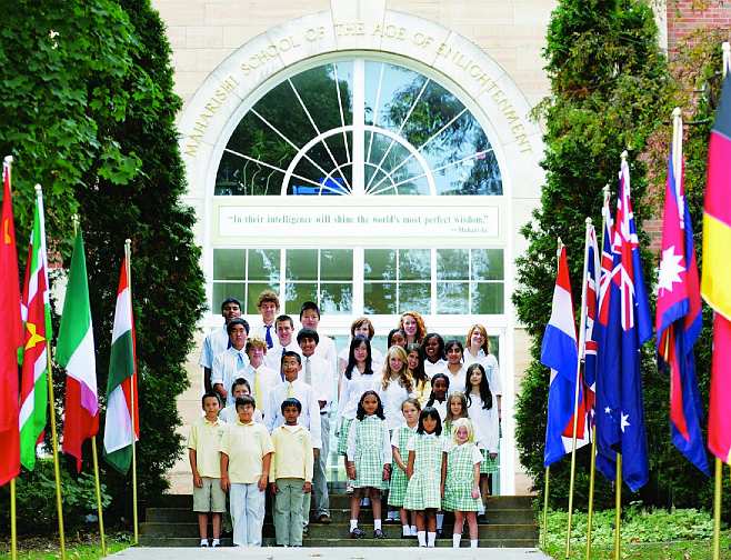 MSAEflags.jpg - 'In their intelligence will shine the world's most perfect wisdom' is the quote of Maharishi Mahesh Yogi inscribed above the front door of MSAE, describing the benefit to students enrolled in Consciousness-Based Education.
