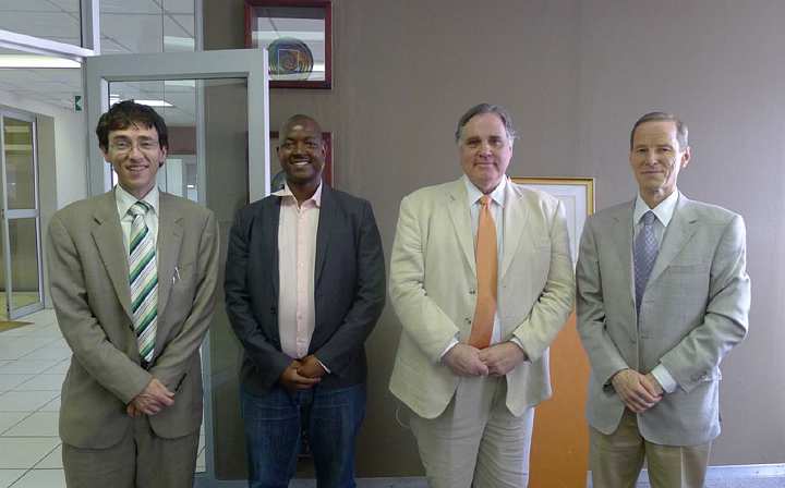 SouthAfrica353.jpg - The group, from left, Dr Taddy Blecher, David Goodman, Dr Bevan Morris, and Dr Richard Peckye prepared for a tour of the Neotel building. Professor David Goodman is on location teaching the Master?s in Business Administration course.