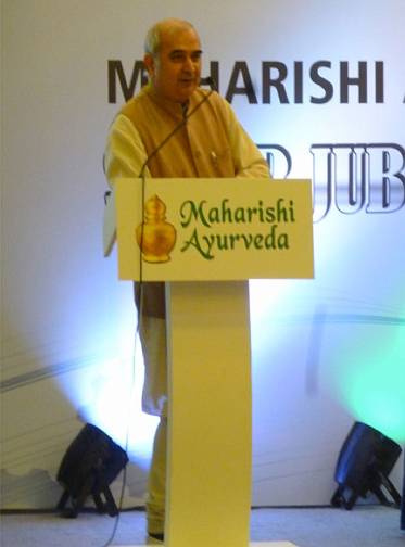 Slide16.jpg - Dr Trivendra Triguna, the son of one of the founding members of the Maharishi Ayurveda Council of Vaidyas (expert physician), Dr Brihaspati Dev Triguna, spoke at the 25th anniversary celebration of Maharishi Ayurveda Products in Delhi.