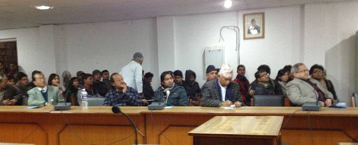 Slide22.jpg - Attendees at the conference, held at Tribhuvan University included Depak Baskota (in hat), and the dean of the university, on the right facing the screen. The conference brought together representatives from Nepal?s modern allopathic medical college and its Ayurveda College.