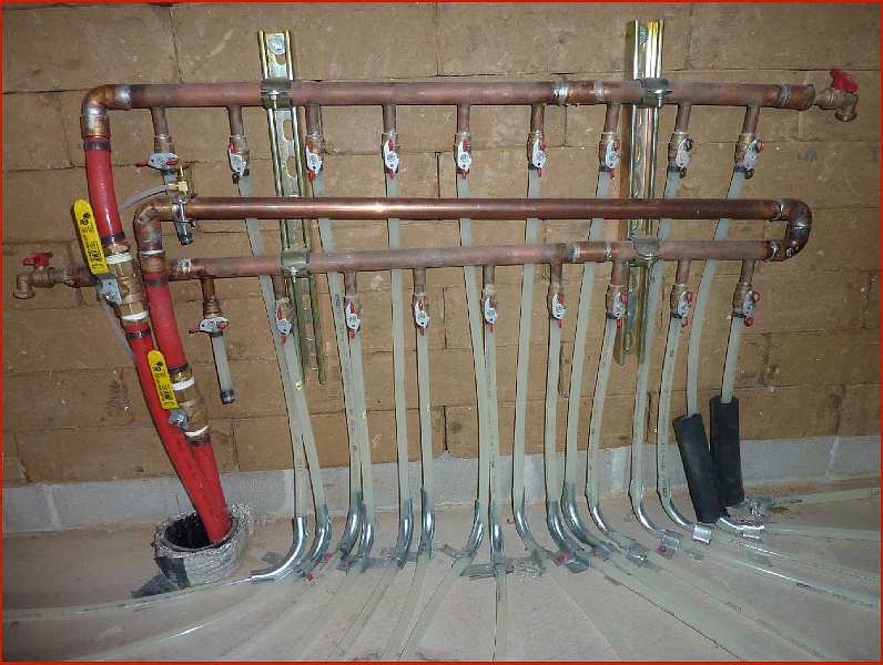 Slide31.jpg - Detail of in-floor radiant heating and cooling system that uses hot or cold water as needed.