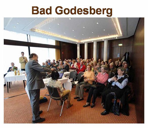 Slide3.jpg - During his presentation in Bad Godesberg, a city near Bohn, Dr Travis explained to the audience how EEG testing works as he attached leads to the demonstrator?s head. They listened attentively, and asked purposeful questions after the lecture.