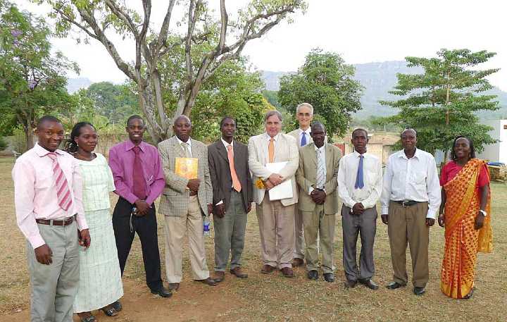 Uganda-GGn-(23).jpg - Dr Morris and Dr de Freitas had a wonderful lunch meeting with all the Ugandan teachers of Transcendental Meditation, a very strong, united, and powerful group. They have a close relationship with the Kenyan teachers, and many of the Maharishi Girls? Secondary School students are from Kenya. Pictured from left to right: Tsongo Bamande, Barbrah Nansubuga, Innocent Mwangi (Kenya), Solomon Mwangi (Kenya National Director and father of Innocent), Patrick Kinuthia (Kenya), Dr Morris, Dr de Freitas, Henry Matovu (Uganda National Director), John Bukenya, Grant Lusimbo, and Judith Nassali.