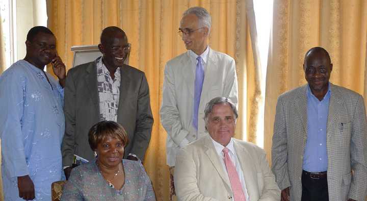 Uganda-GGn-(42).jpg - Dr Morris and Dr de Freitas are pictured with local government and business officials who attended the lecture. Some are already practising the Transcendental Meditation Technique.